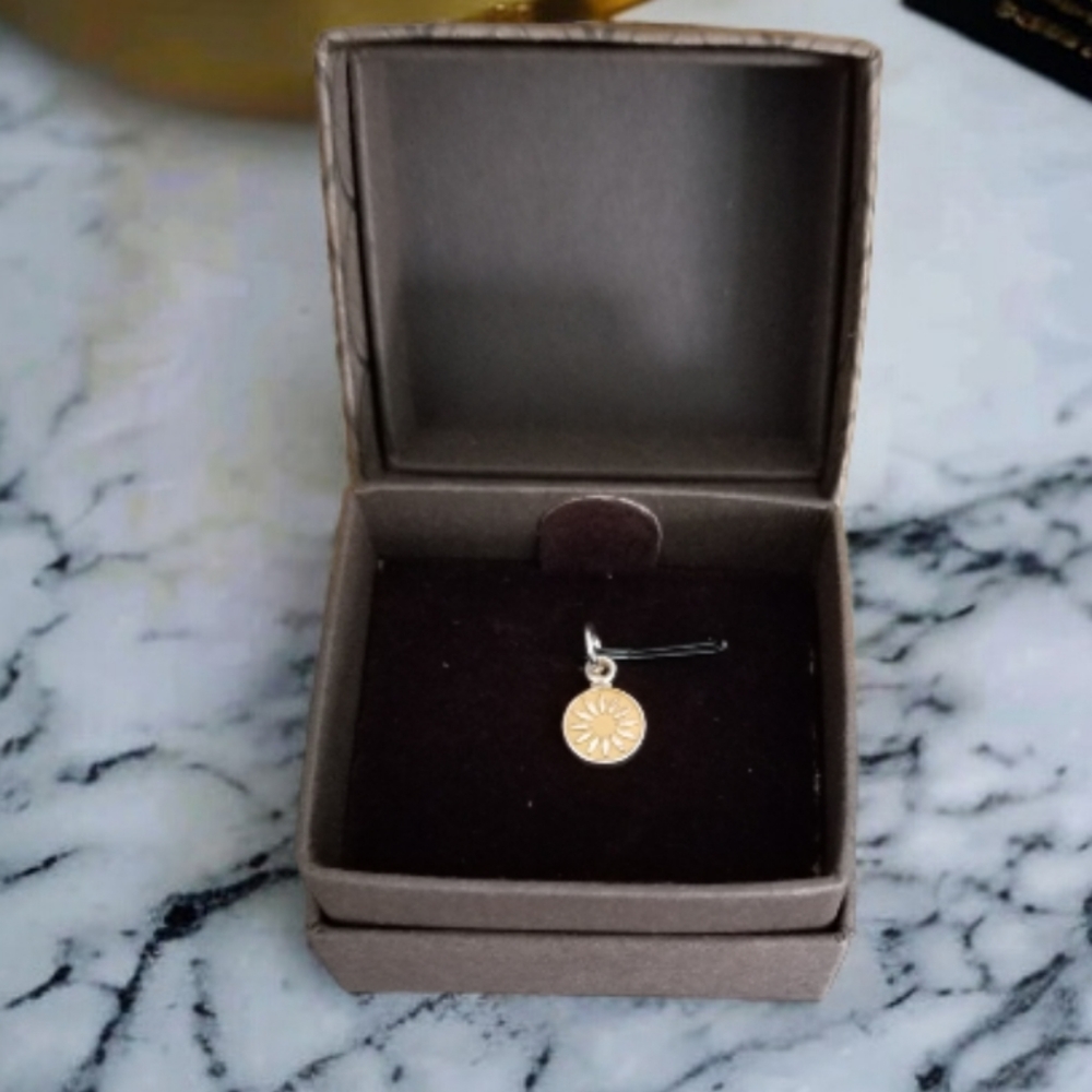 O.C. Tanner Sterling Silver Starburst Pendant